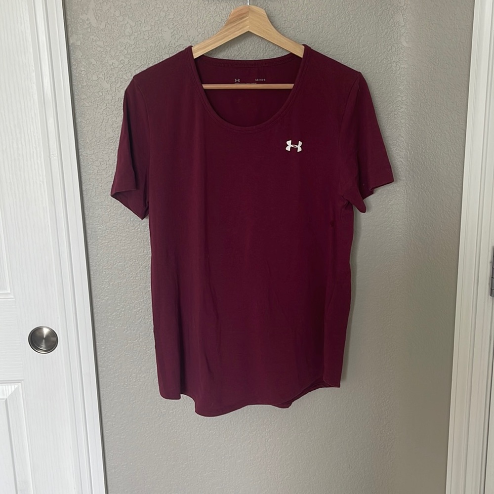 Maroon women’s Under Armour shirt